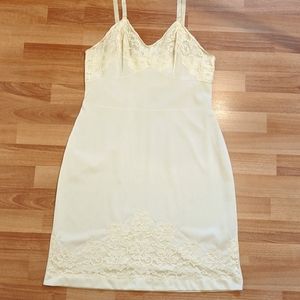 Vintage pale yellow Dorsay dress slip